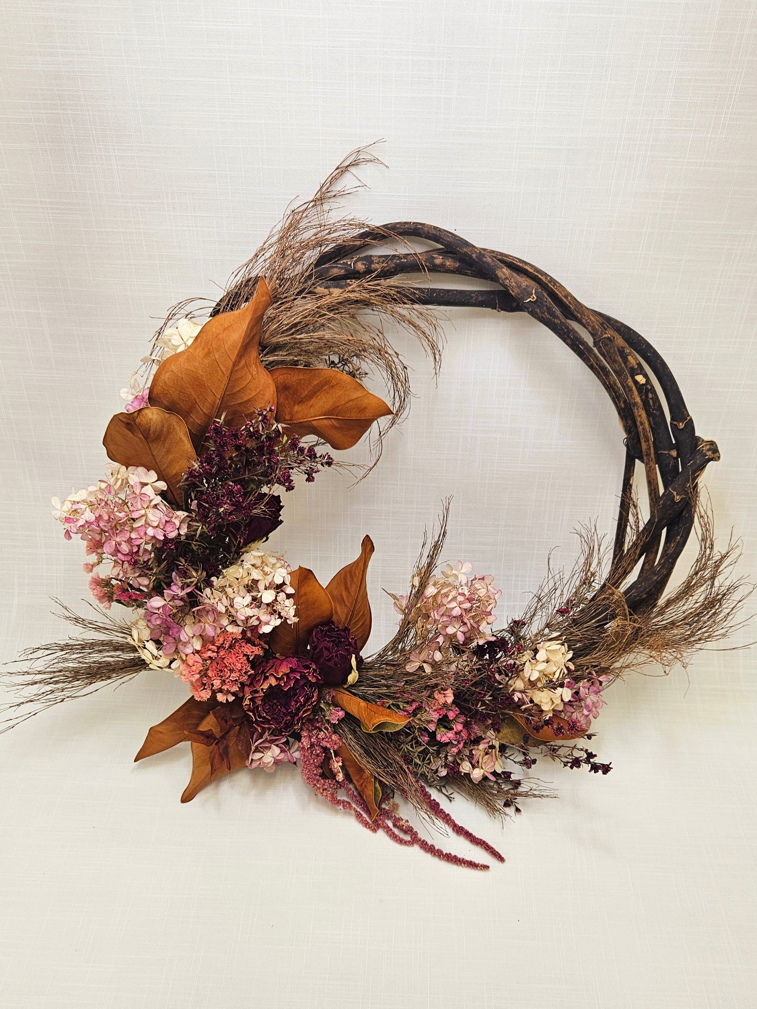 Forever Floral Wreath (Dried) in Warm Welcome. Autumnal shades of dried flowers and foliage.