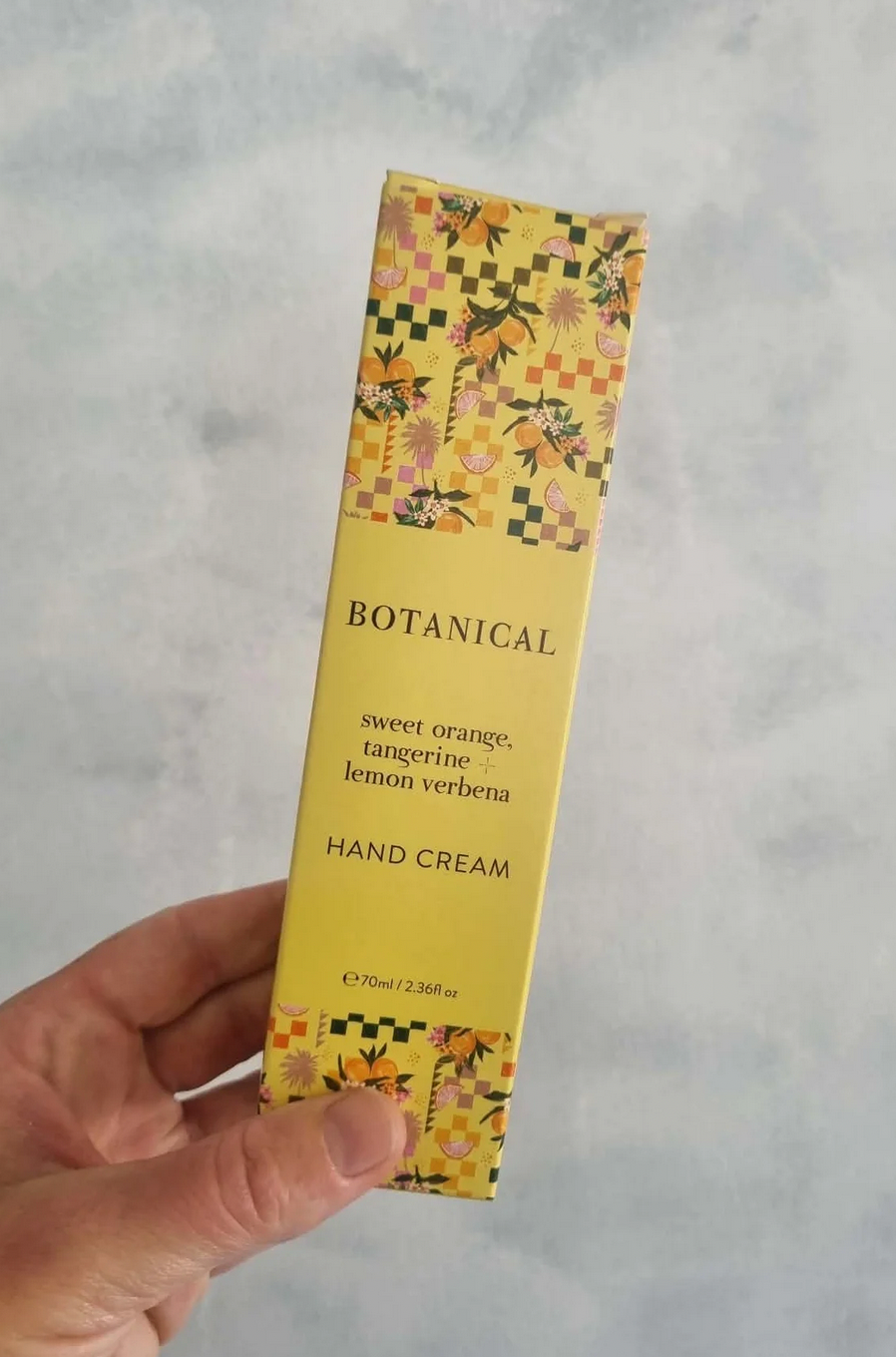 A box of Botanical Skincare Hand Cream in the scent Sweet Orange, Tangerine & Lemon Verbena.