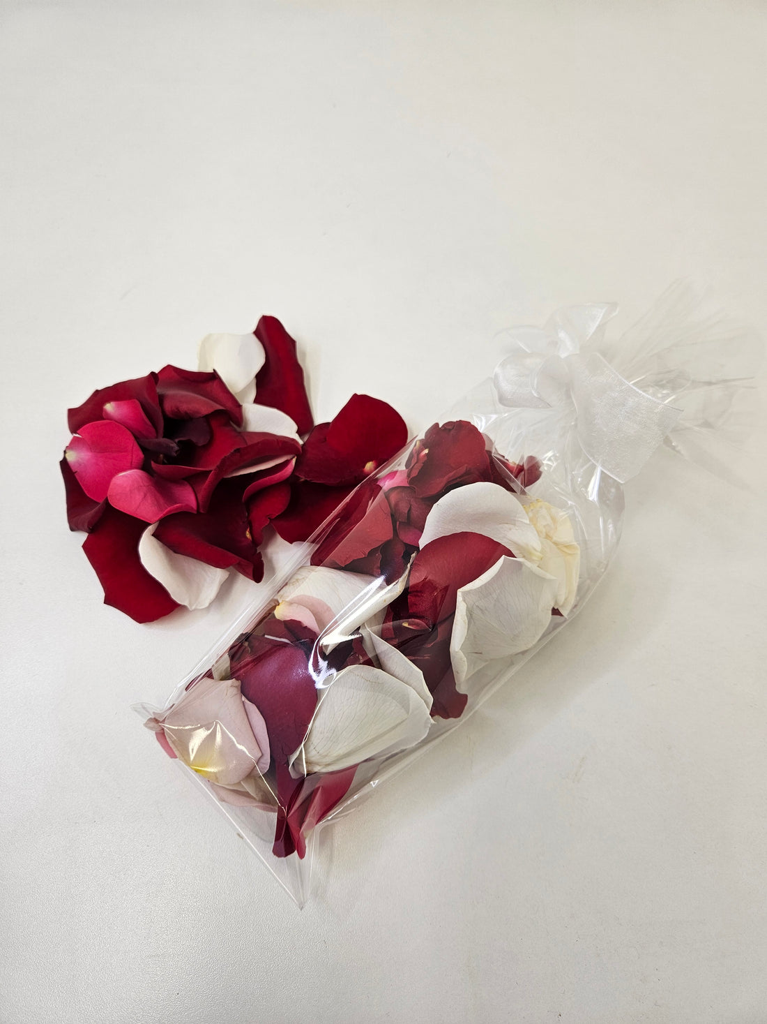 Clear bag of Fresh Petals - an optional add-on to the bridal Bloom Box.