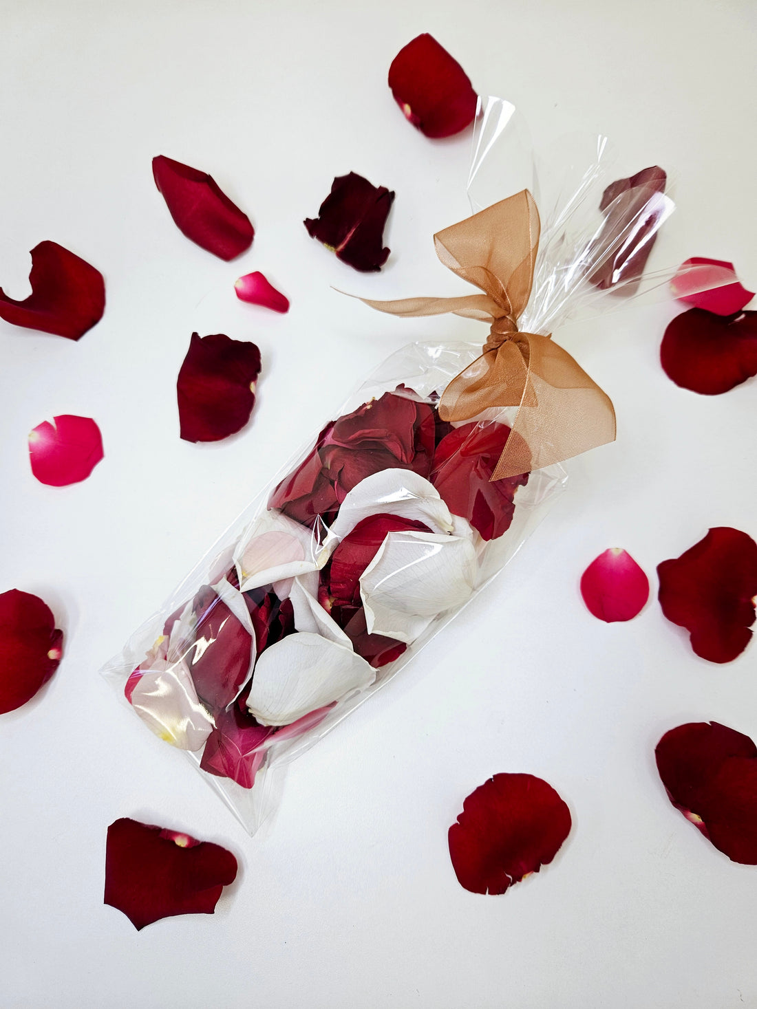 Clear bag of fresh red rose Petal Confetti.