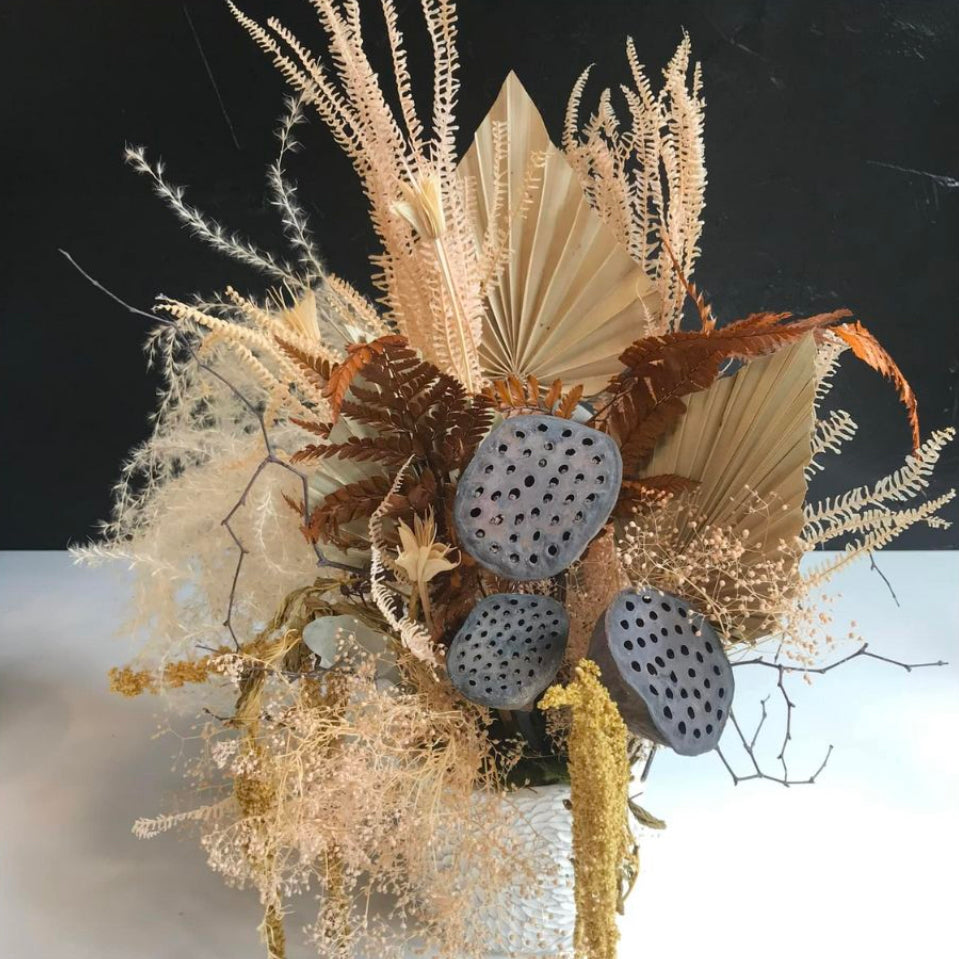 Dried Meadow Arrangement, with neutral tone dried flowers and foliage. Comes with its own ceramic pot.