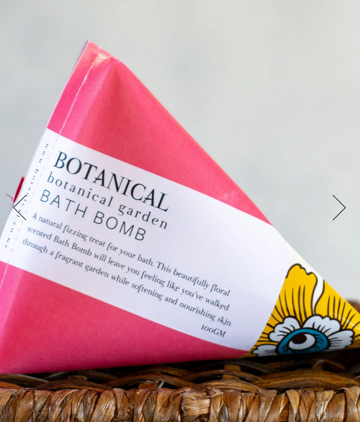 A bright pink pack containing a Bath Bomb in the scent Botanical Garden by Botanical Skincare.